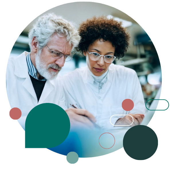 life-sciences Researcher looking at clipboard in a lab surrounded by pie charts